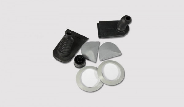 Gaskets with sealing and damping elements